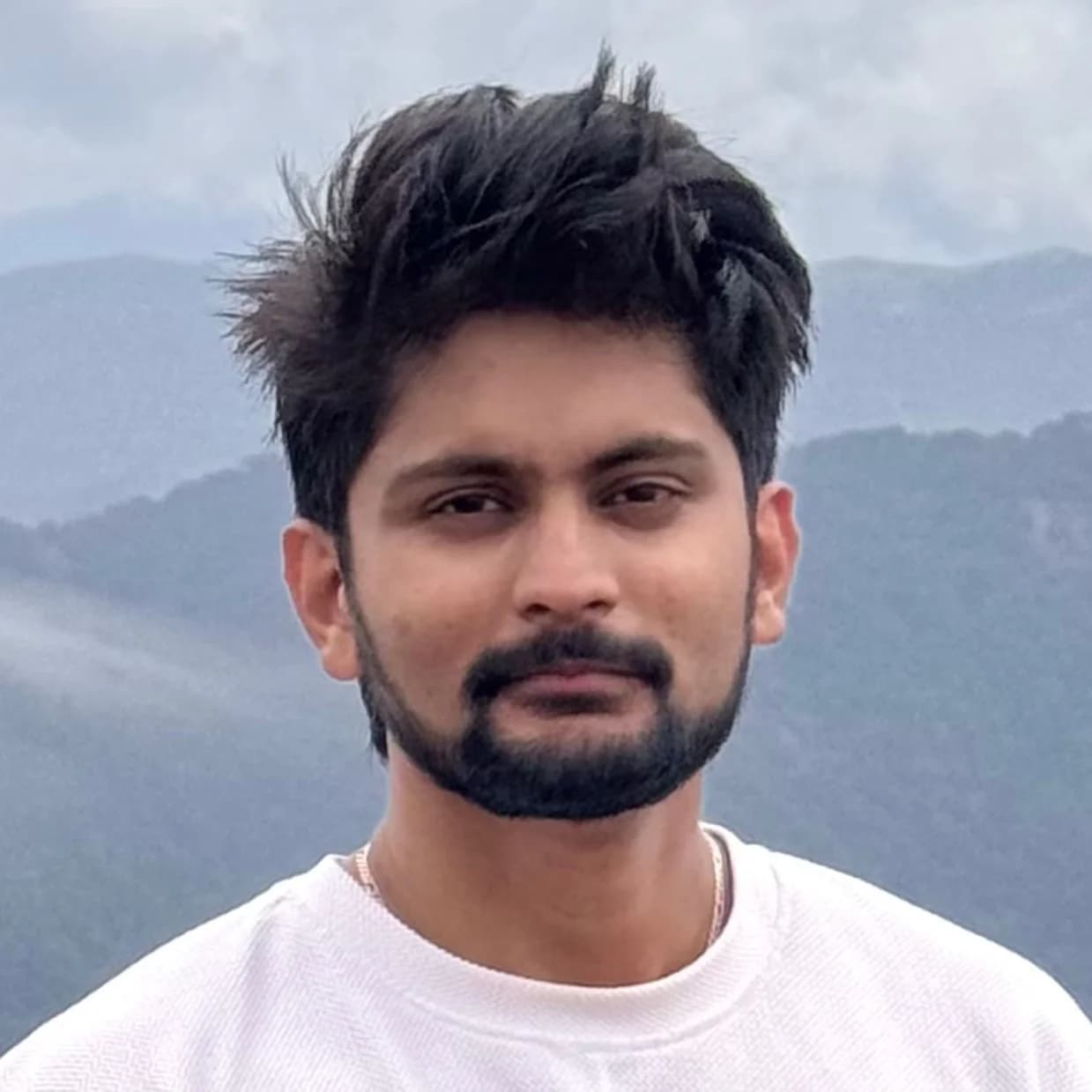 Amar Karthik profile portrait